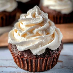 Delicious homemade marshmallow frosting spread over a chocolate cake