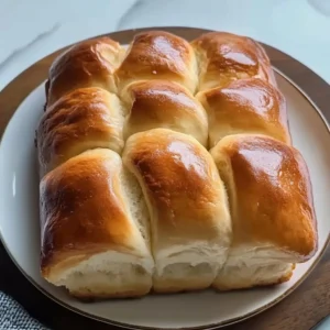 Delicious sweet condensed milk bread loaf on a wooden table